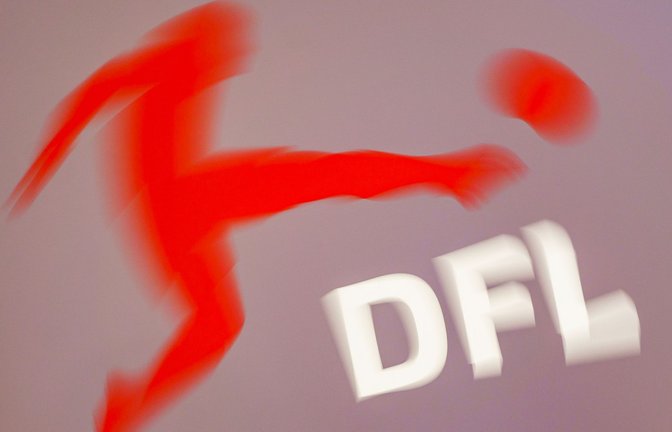 Das Logo der DFL Deutsche Fußball Liga am Rande einer DFL-Mitgliederversammlung (Aufnahme mit Dreheffekt).<span class='image-autor'>Foto: Frank Rumpenhorst/dpa</span>