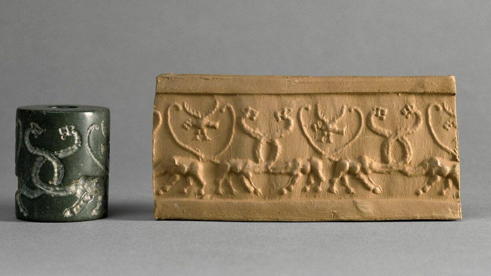 Die Figuren auf diesem rund 6000 Jahre alten mesopotamischen Siegelzylinder könnten die frühesten Vorläufer der Schrift sein.Foto: © 2001 GrandPalaisRmn/Musée du Louvre/Franck Raux Die Figuren auf diesem rund 6000 Jahre alten mesopotamischen Siegelzylinder könnten die frühesten Vorläufer der Schrift sein.Foto: © 2001 GrandPalaisRmn/Musée du Louvre/Franck Raux