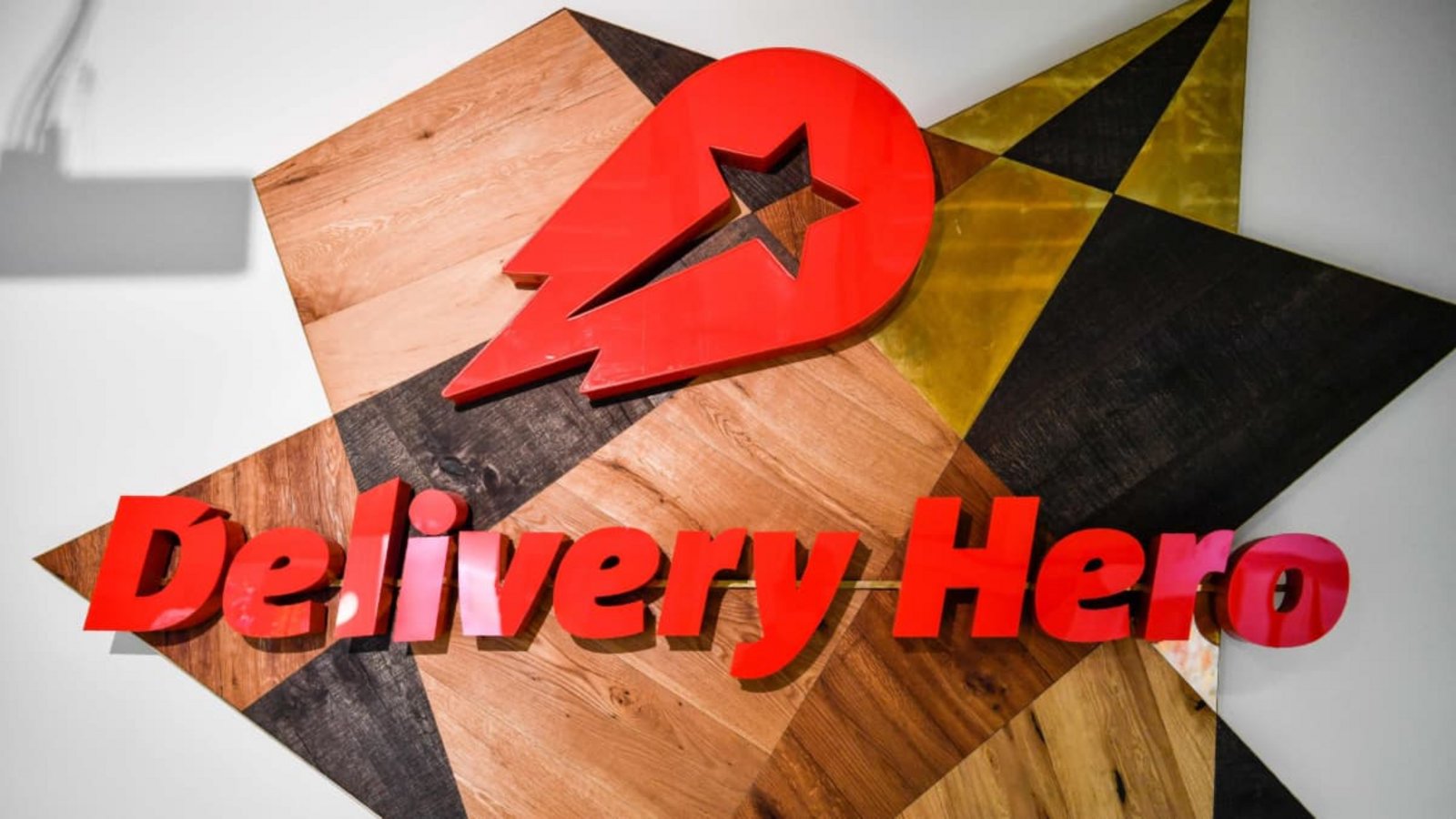 Das amerikanische Unternehmen Uber und der deutsche Essenslieferanten Delivery Hero haben sich auf eine milliardenschwere Übernahme geeinigt.JOHN MACDOUGALL/afp