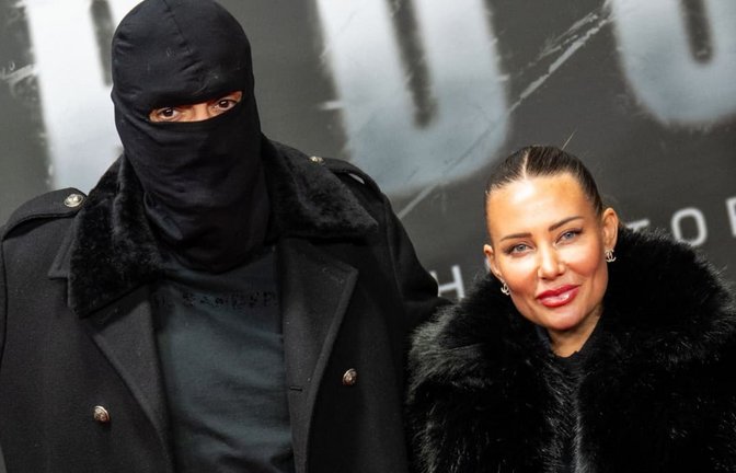 Damals Drehbuch, jetzt wieder tödlicher Ernst:Aykut Anhan und seine Frau Nina Anhan kommen zu einer Sonderaufführung der Dokumentation „Babo - Die Haftbefehl-Story“.<span class='image-autor'>Christophe Gateau/dpa</span>