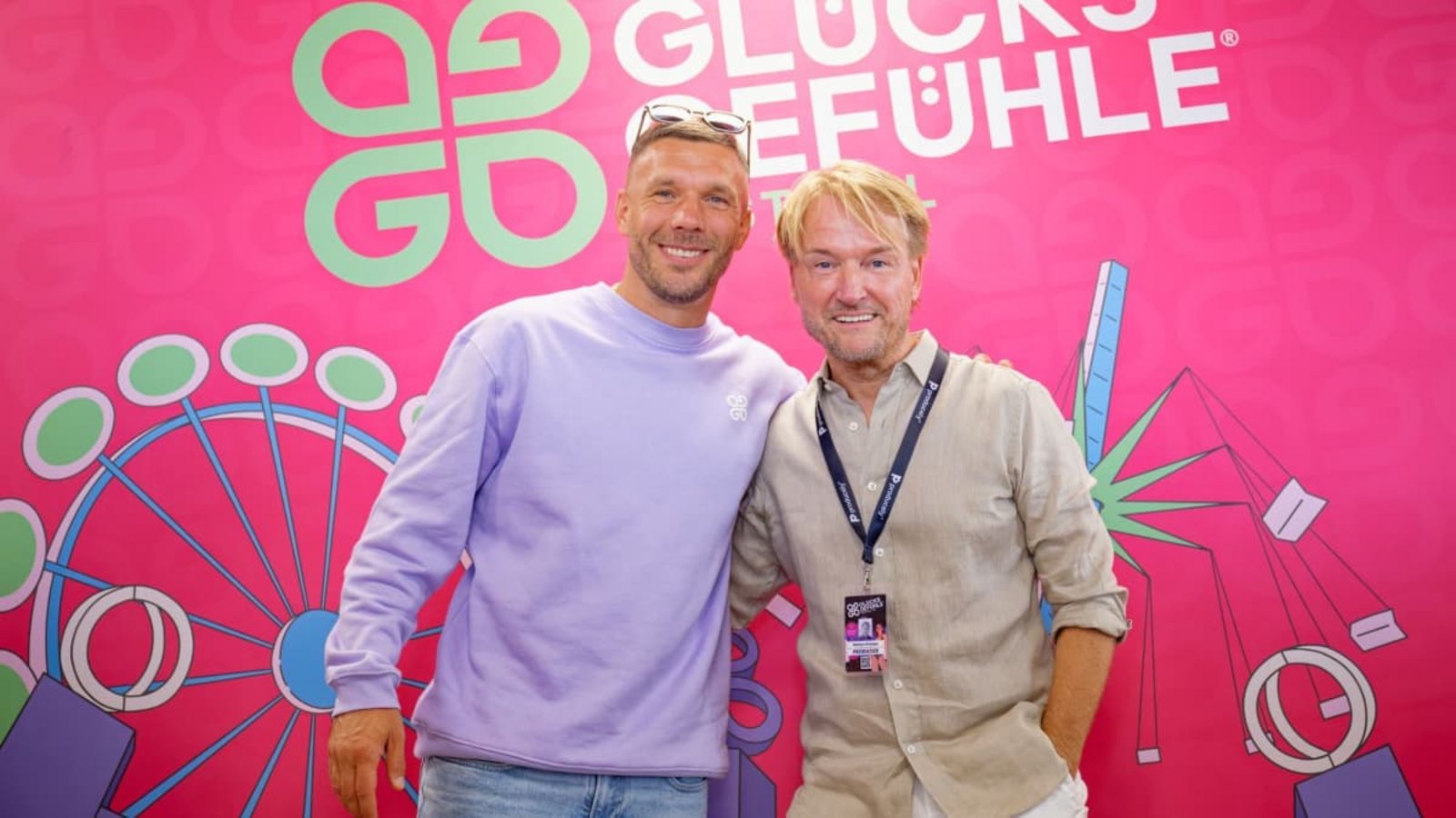 Die Macher des Glücksgefühle-Festivals stehen in der Kritik: Lukas Podolski (links) und Markus Krampe.Uwe Anspach/dpa Die Macher des Glücksgefühle-Festivals stehen in der Kritik: Lukas Podolski (links) und Markus Krampe.Uwe Anspach/dpa