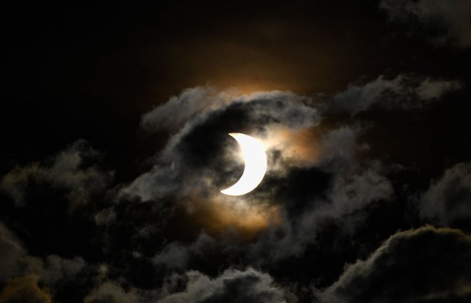 Eine beginnende Finsternis über dem Himmel von Kenia 2020.<span class='image-autor'>Foto: dpa/Li Yan</span>