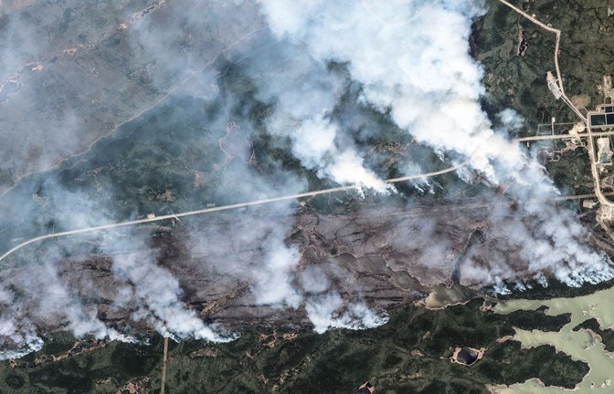 In Kanada sind viele Waldbrände außer Kontrolle.<span class='image-autor'>Foto: Maxar Technologies/AP/dpa</span>