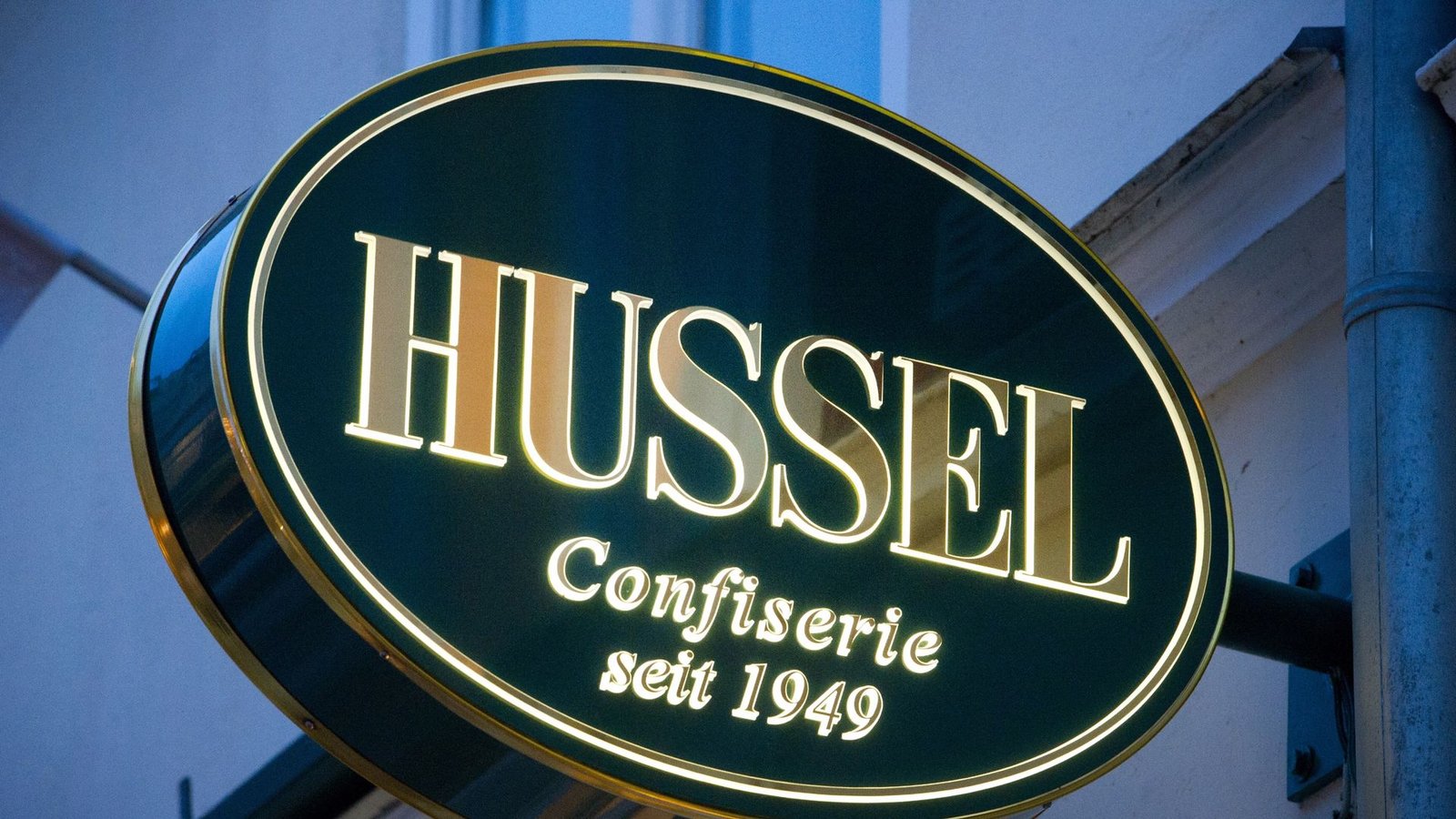 Das Logo der Confiserie "Hussel".Foto: Stefan Sauer/dpa-Zentralbild/dpa