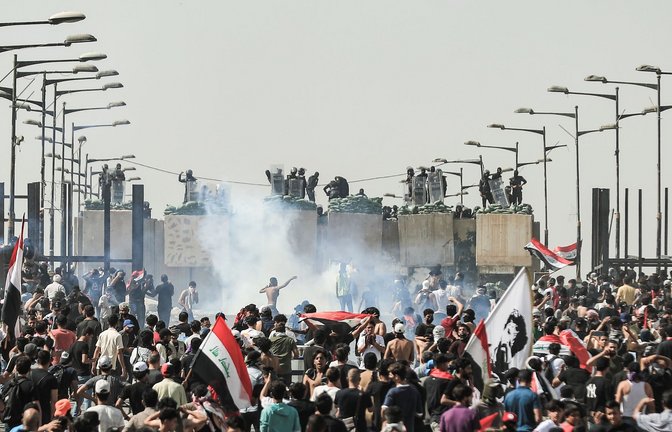 Demonstration anlässlich des dritten Jahrestages der Anti-Regierungs-Proteste auf dem Tahrir-Platz in Bagdad.<span class='image-autor'>Foto: Ameer Al-Mohammedawi/dpa</span>