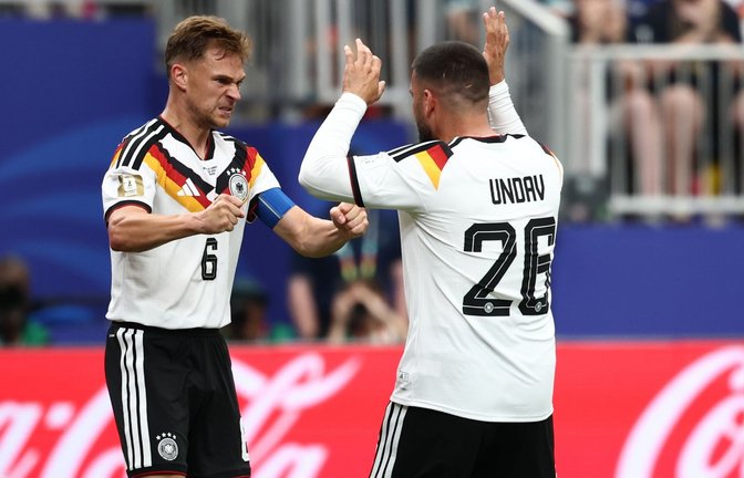 Ein typischer Joshua Kimmich beim Jubeln mit geballten Fäusten nach seiner Torvorlage für Deniz Undav.<span class='image-autor'>Foto: Christian Charisius/dpa</span>
