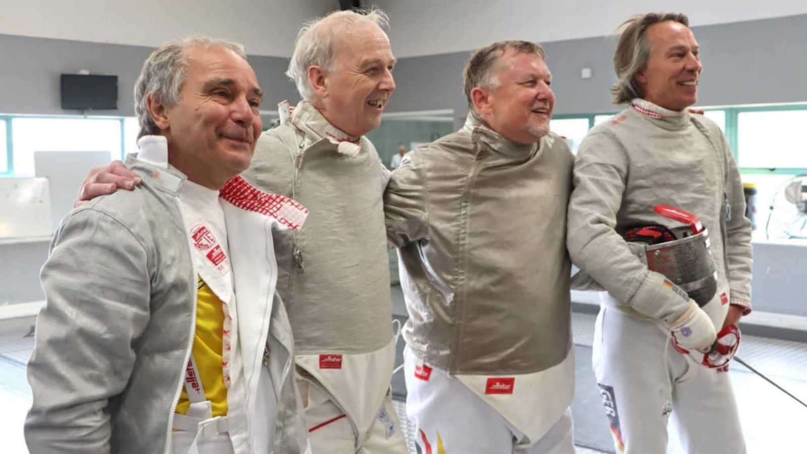 Thomas Maier, Olaf Ziebell, Udo Ziegler und Helge Ulrich (von links) freuen sich über den Sieg gegen Großbritannien.oh Thomas Maier, Olaf Ziebell, Udo Ziegler und Helge Ulrich (von links) freuen sich über den Sieg gegen Großbritannien.oh