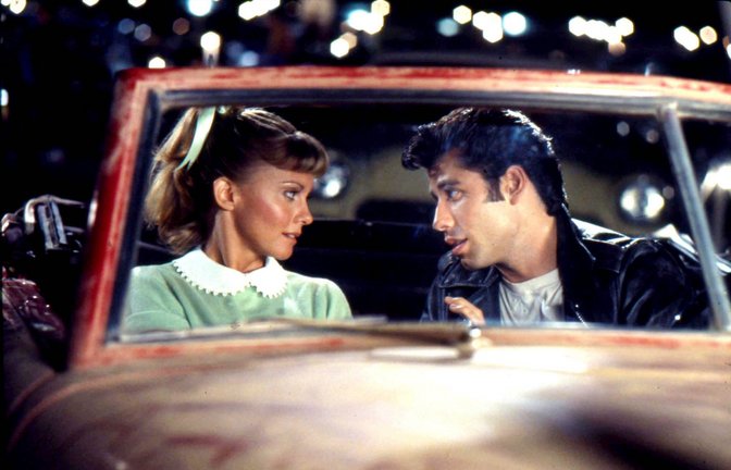 Olivia Newton-John als „Sandy“ und John Travolta als „Danny“ aus dem Film „Grease“.<span class='image-autor'>Foto: dpa/Paramount Pictures</span>