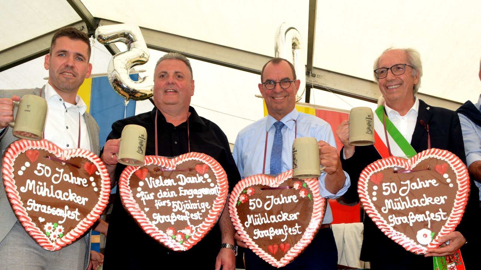Sie feiern gemeinsam das 50. Mühlacker Straßenfest (von links): Sven Schrade, Jochen Schray, Frank Schneider und Mariano Scotton.    