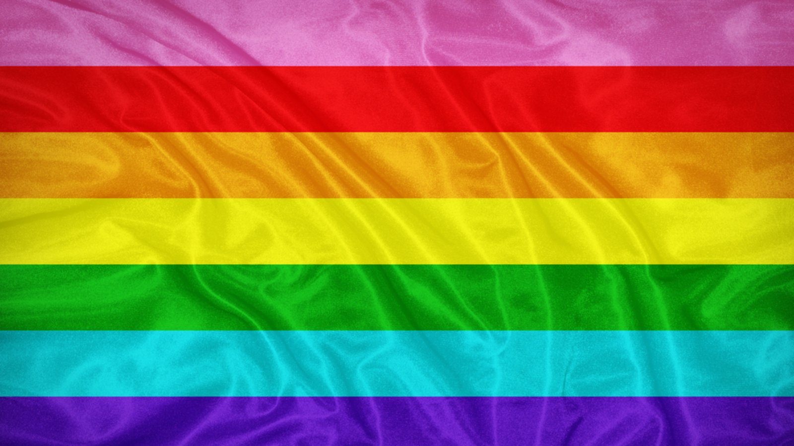 Die originale Pride-Flagge mit 8 Farben: Pink und Türkis wurden aus produktionstechnischen Gründen aus dem Original-Design entfernt, werden heutzutage aber teilweise wieder verwendet.Foto: Wasan Ritthawon/Shutterstock Die originale Pride-Flagge mit 8 Farben: Pink und Türkis wurden aus produktionstechnischen Gründen aus dem Original-Design entfernt, werden heutzutage aber teilweise wieder verwendet.Foto: Wasan Ritthawon/Shutterstock