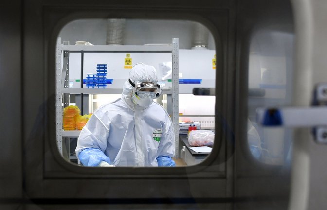 So lange China mauert, wird sich die Herkunft des Coronavirus wahrscheinlich nie endgültig klären lassen.<span class='image-autor'>Foto: Cheng Min/XinHua/dpa</span>