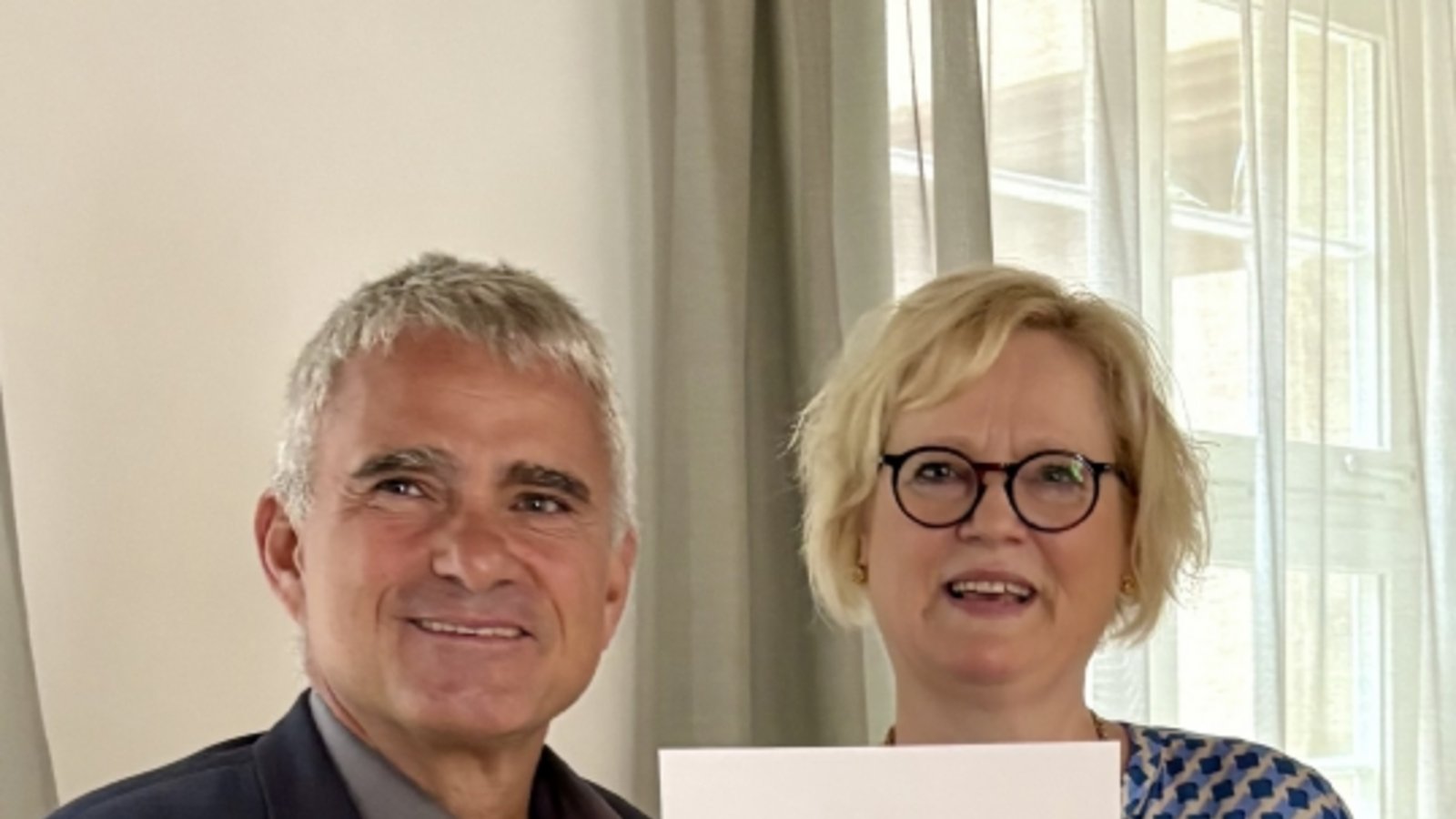 Inga Mollerus 40 Jahre öffentlicher Dienst Stadtverwaltung Sachsenheim Bürgermeister Holger Albrich Foto:p