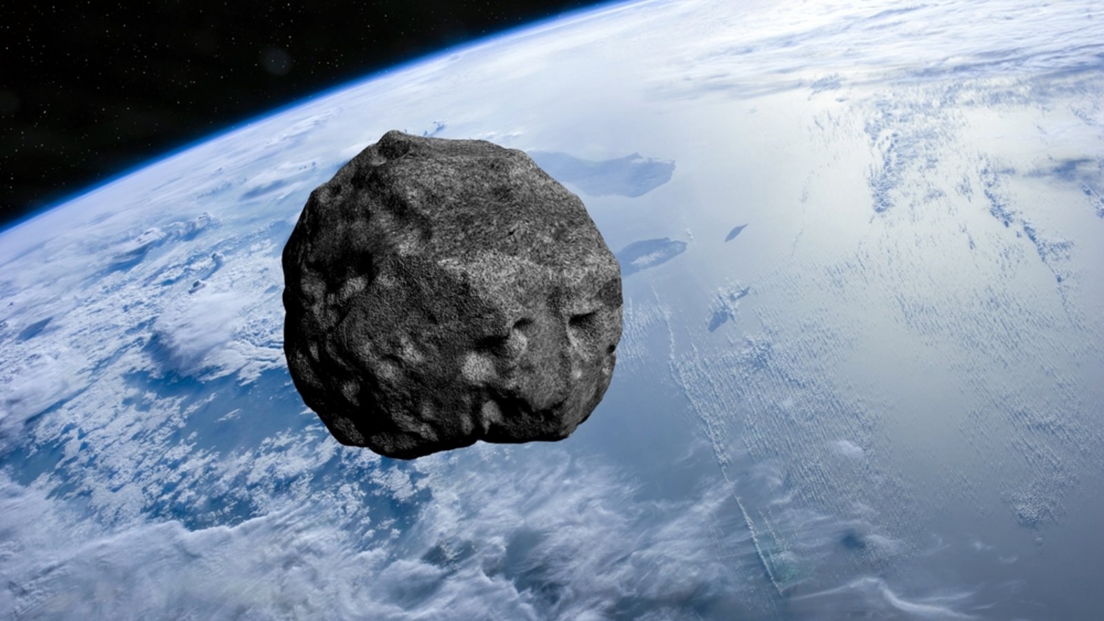 Asteroid über der Erde (Symbolbild)Foto: buradaki / shutterstock.com