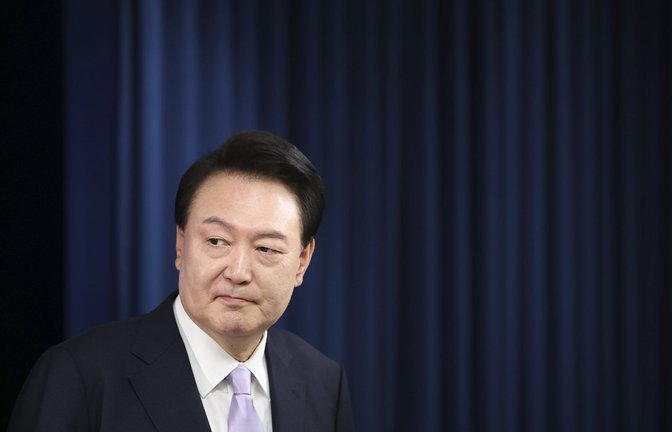 Der ehemalige südkoreanische Präsident muss sich vor Gericht verantworten. (Archivbild)<span class='image-autor'>Foto: dpa/KIM HONG-JI</span>
