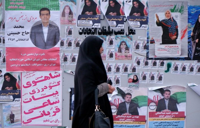Wahlplakate in Teheran. Am Freitag wählt der Iran ein neues Parlament und den Expertenrat.<span class='image-autor'>Foto: Rouzbeh Fouladi/ZUMA Press Wire/dpa</span>