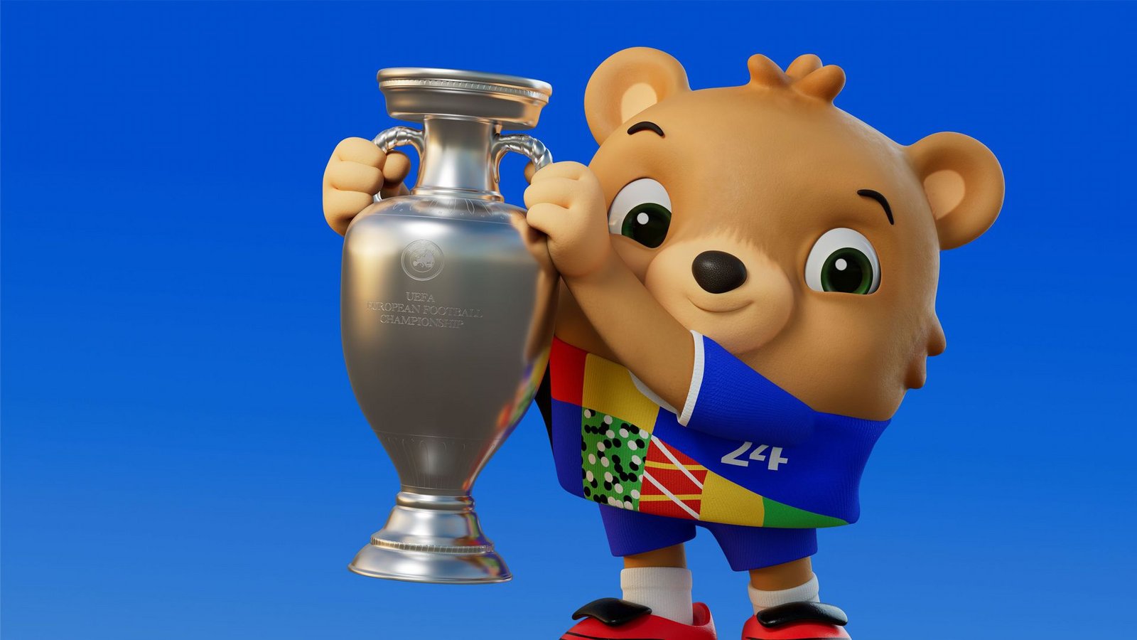 Diesmal mit Hose: Das Maskottchen für die EM 2024 ist ein Bär mit mehr Kleidung als noch der Löwe „Goleo“ (2006), der unten ohne auskommen musste.Foto: UEFA Diesmal mit Hose: Das Maskottchen für die EM 2024 ist ein Bär mit mehr Kleidung als noch der Löwe „Goleo“ (2006), der unten ohne auskommen musste.Foto: UEFA