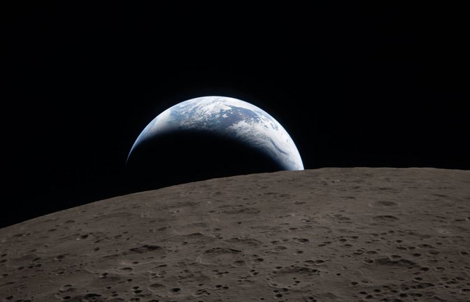 Diesen Blick auf die Erde hat die "Artemis 2"-Crew während ihres Mondfluges aufgenommen.<span class='image-autor'>Foto: Uncredited/NASA/AP/dpa</span>