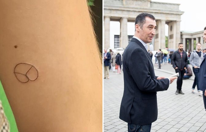 Die Grünen haben auf ihrer Wahlparty kostenlose Tattoos angeboten. Der Grünen-Politiker Cem Özdemir bekommt seit Jahren Polizeischutz. Das Bild zeigt ihn 2016 vor dem Brandenburger Tor.<span class='image-autor'>Foto: StZN/dpa/Kay Nietfeld</span>