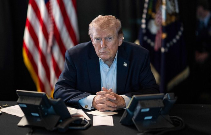 Us-Präsident Donald Trump bechert Wladimir Putin einen Erfolg.<span class='image-autor'>Foto: AFP</span>