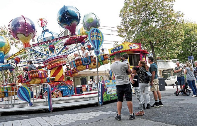 Kinderfahrgeschäfte bestimmen die Mini-Mess in Pforzheim. Foto: Roth