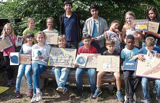Kinder aus acht Nationen haben in Schützingen bei einer ausgerufenen internationalen Kunstwoche gemeinsam Bilder erschaffen.  Foto:
