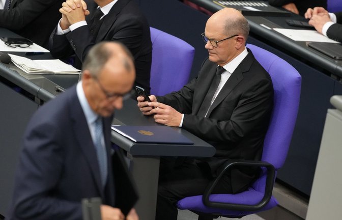 Merz (CDU) und Scholz (SPD) streben in unterschiedliche Richtungen.<span class='image-autor'>Foto: dpa/Kay Nietfeld</span>