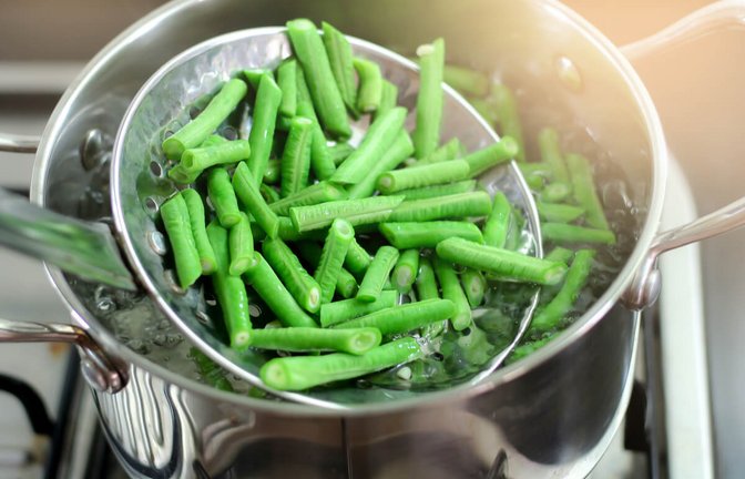 So lange müssen Sie grüne Bohnen kochen, damit sie verträglich sind. Alle Kochzeiten der Garmethoden im Überblick.<span class='image-autor'>Foto: Pradit.Ph / Shutterstock.com</span>