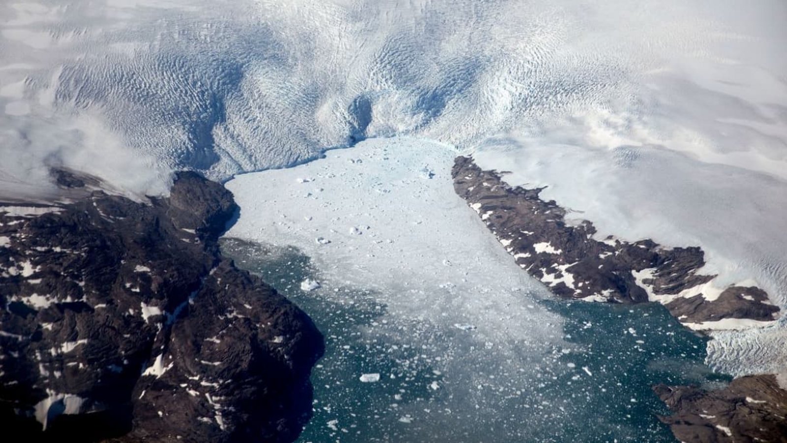 Eisberge brechen von einem Gletscher in einen Fjord in Grönland.David Goldman/AP/dpa Eisberge brechen von einem Gletscher in einen Fjord in Grönland.David Goldman/AP/dpa