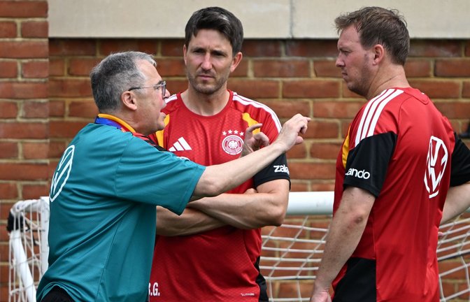 Andreas Rettig (l.) vertritt bei den Prämienverhandlungen die DFB-Seite.<span class='image-autor'>Foto: Federico Gambarini/dpa</span>