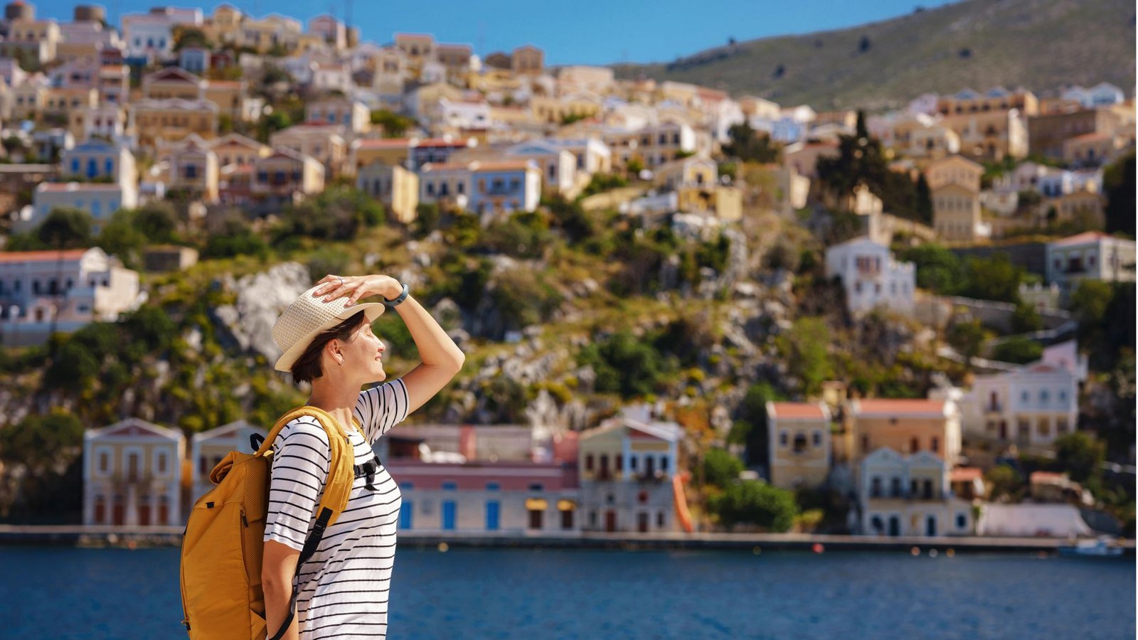 Die bunten Häuser am Hafen der kleinen Insel Symi sind ein beliebtes Fotomotiv.Foto: /Pond5 Images Die bunten Häuser am Hafen der kleinen Insel Symi sind ein beliebtes Fotomotiv.Foto: /Pond5 Images
