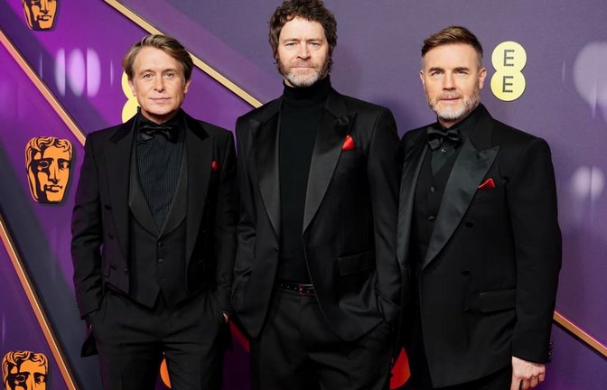 Gary Barlow, Howard Donald und Mark Owen von der Band Take That kommen 2027 wieder zu Konzerten nach Deutschland.<span class='image-autor'>Ian West/PA Wire/dpa</span>