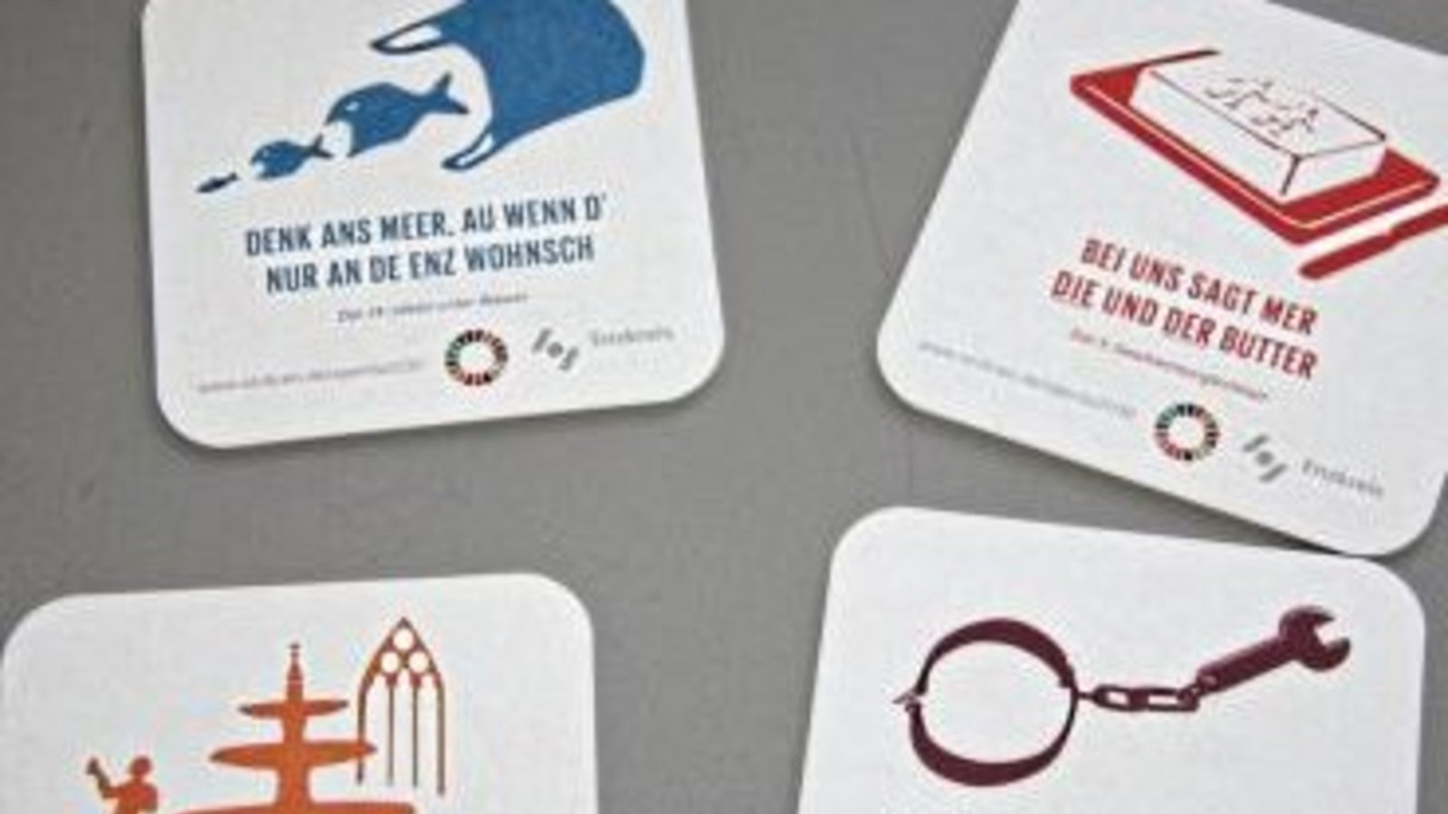 Vier der 17 Bierdeckel-Slogans. Foto: LE Vier der 17 Bierdeckel-Slogans. Foto: LE