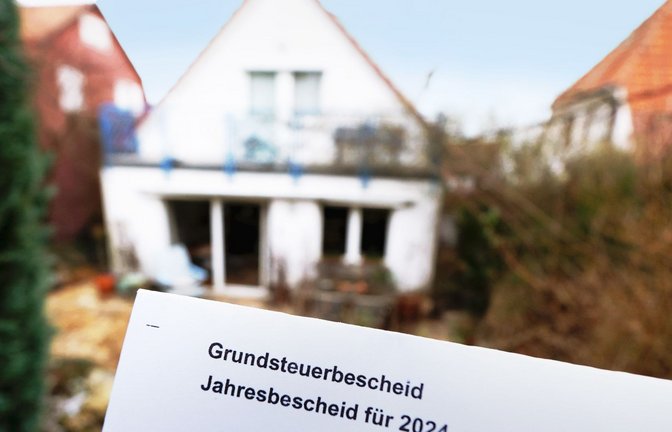 Glück haben Immobilienbesitzer, die nur eine Mini-Grundsteuer  zahlen müssen. Lästig kann das aber auch sein.<span class='image-autor'>Foto: dpa</span>