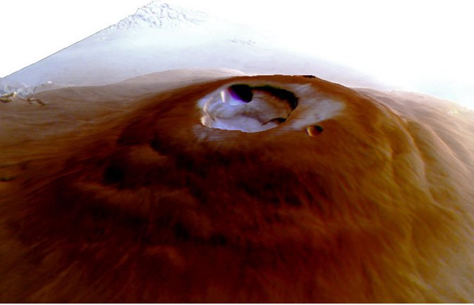 Auf dem größten Vulkan im Sonnensystem, dem Mars-Vulkan Olympus Mons, gibt es Wassereis. Denn an seinem Gipfel bildet sich im Winter morgens Raureif, wie Planetenforscher entdeckt haben.<span class='image-autor'>Foto: © Adomas Valantinas/Nature Geoscience</span>