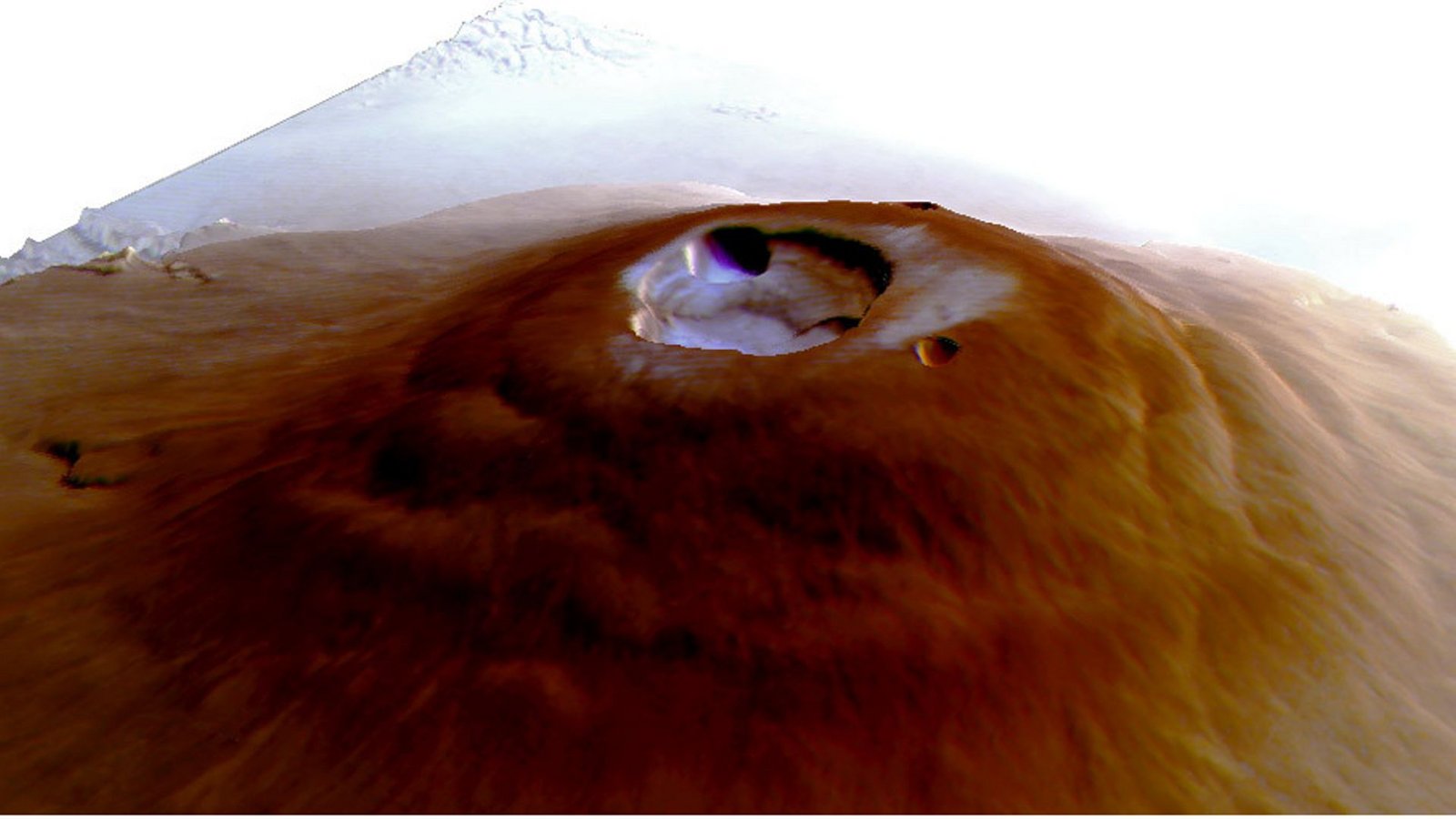 Auf dem größten Vulkan im Sonnensystem, dem Mars-Vulkan Olympus Mons, gibt es Wassereis. Denn an seinem Gipfel bildet sich im Winter morgens Raureif, wie Planetenforscher entdeckt haben.Foto: © Adomas Valantinas/Nature Geoscience Auf dem größten Vulkan im Sonnensystem, dem Mars-Vulkan Olympus Mons, gibt es Wassereis. Denn an seinem Gipfel bildet sich im Winter morgens Raureif, wie Planetenforscher entdeckt haben.Foto: © Adomas Valantinas/Nature Geoscience