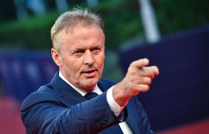 Mit der Geschichte eines verzweifelt um seine Unschuld kämpfenden Anwalts hält der Bestsellerautor der US-Justiz den Spiegel vor. (Archivbild)<span class='image-autor'>Foto: Loic Venance/AFP/dpa</span>
