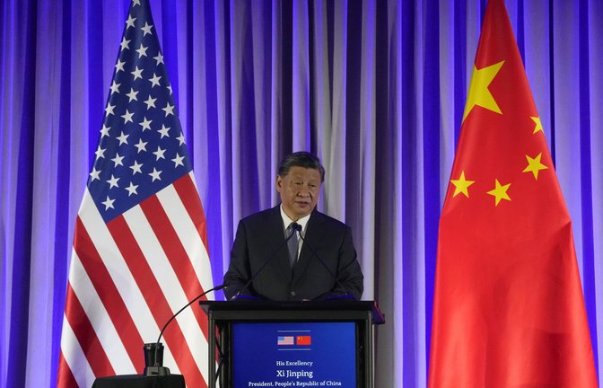 Präsident Xi hätte nicht mit leeren Händen nach China zurück kommen können.<span class='image-autor'>Foto: dpa/Jeff Chiu</span>