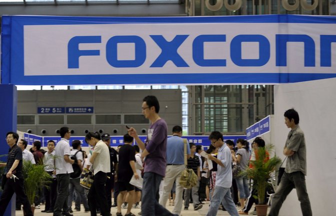 Angestellte eines Foxconn-Werkes.<span class='image-autor'>Foto: Xuan Hui/FEATURECHINA/dpa</span>