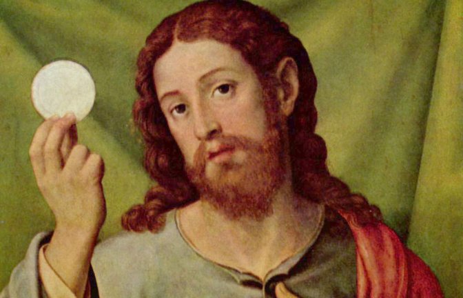 Christus als eucharistischer Heiland: in seiner rechten Hand die Hostie, auf dem Tisch die Reliquie des Heiligen Kelchs (Juan de Joanes, Spanien nach 1550).<span class='image-autor'>Foto: W/kipedia commons/Vicente Juan Masip/The Yorck Project (2002)</span>