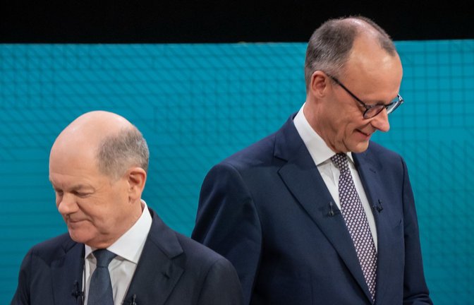Nur einmal stimmen sie wirklich überein: Kanzler Olaf Scholz (SPD) und Herausforderer Friedrich Merz (CDU).<span class='image-autor'>Foto: dpa/Michael Kappeler</span>