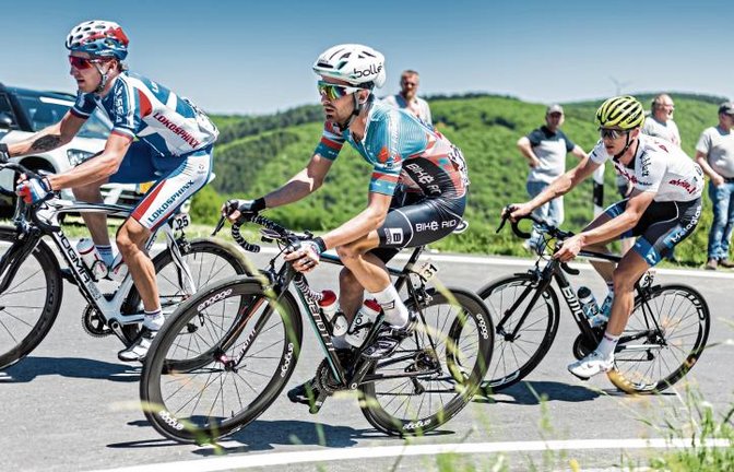 Ein großer Traum geht für Nikodemus Holler (Mitte) erneut in Erfüllung. Das Team des Eberdinger Straßenradprofis erhält eine Wildcard für die Deutschland-Tour. Foto: Archiv/Hilger