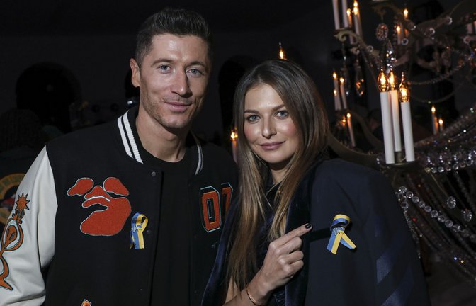 Robert Lewandowski mit seiner Ehefrau Anna auf der Fashion Week.<span class='image-autor'>Foto: dpa/Vianney Le Caer</span>