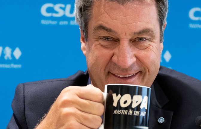 Söder mit Yoda-Tasse – eine beliebte Figur im Star Wars-Kosmos<span class='image-autor'>Foto: Sven Hoppe/dpa</span>