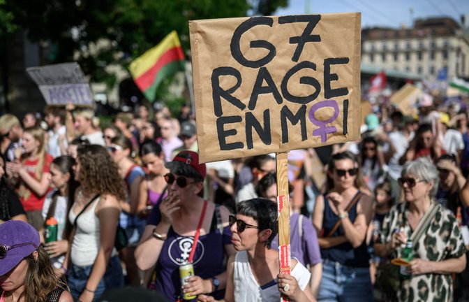Protestzug gegen die G7 in Genf<span class='image-autor'>Foto: AFP/FABRICE COFFRINI</span>